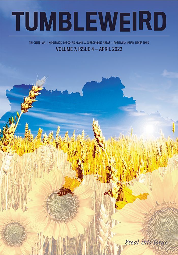 TUMBLEWEIRD; Tri-Cities, WA; Kennewick, Pasco, Richland, & surrounding areas; Positively weird, never timid; Volume 7, issue 4 — April 2022  Image shows the outline of Ukraine masked over an image of a blue sky, wheat fields, and sunflowers that mirrors the Ukraine flag colors.