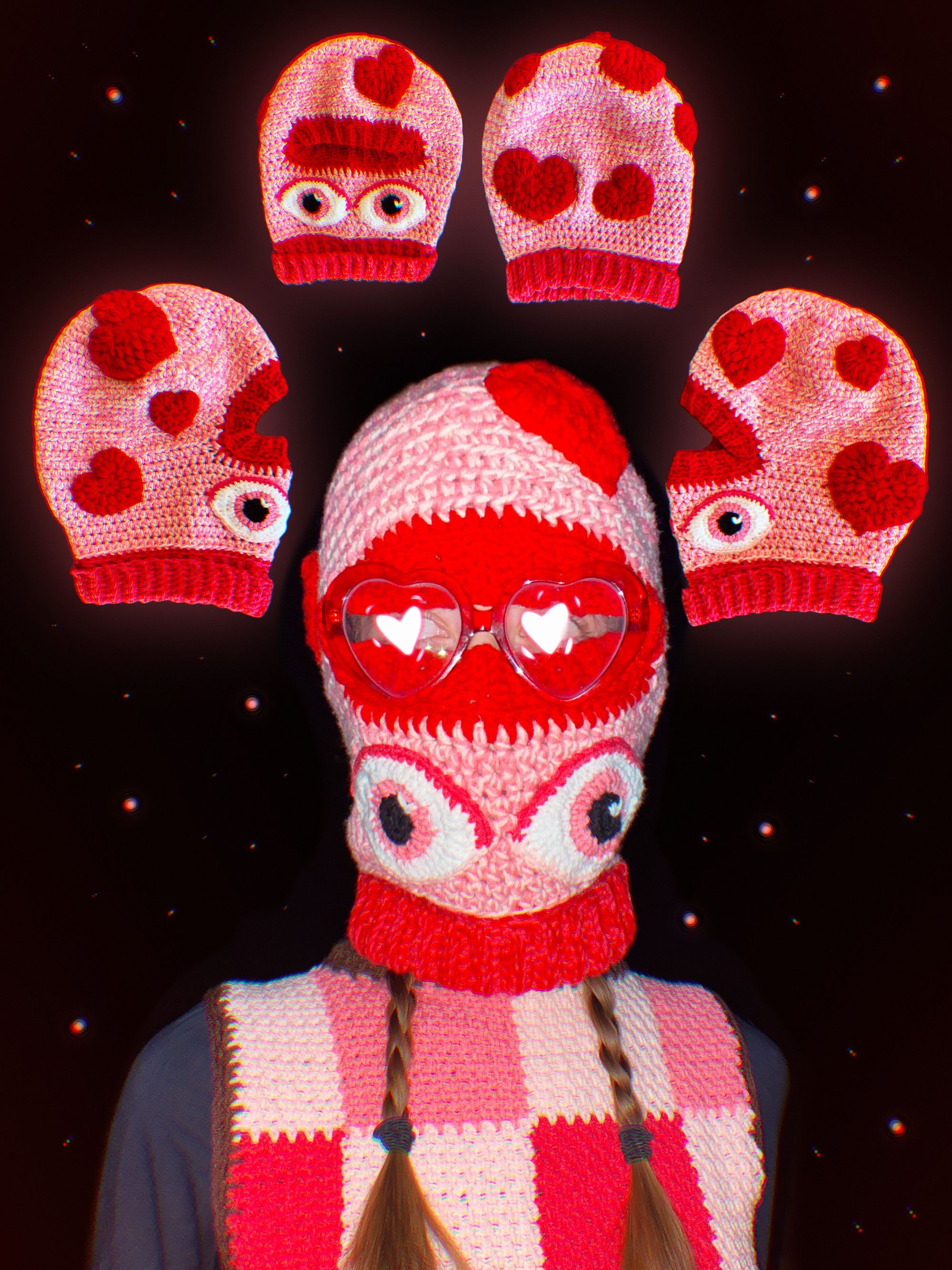 Crocheted mask and vest. The mask has eyes attached.