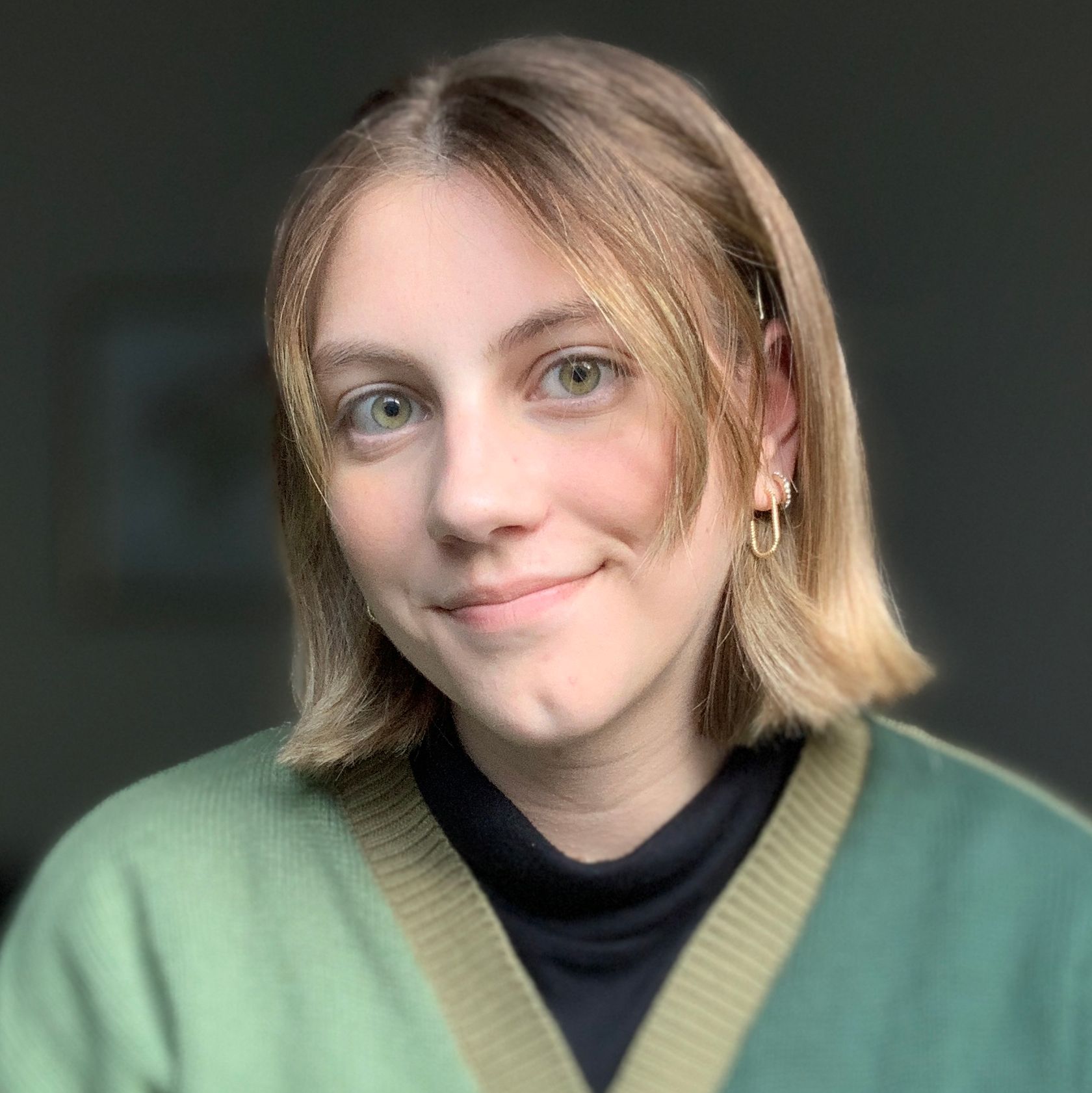 Photo of a young woman with fair skin and blonde hair