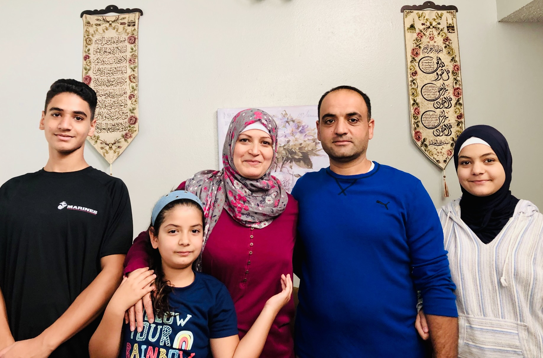 The Alsousi family in their home