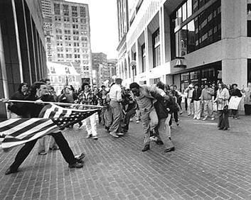The Soiling of Old Glory, depicting a white teenager, Joseph Rakes, assaulting a black man.